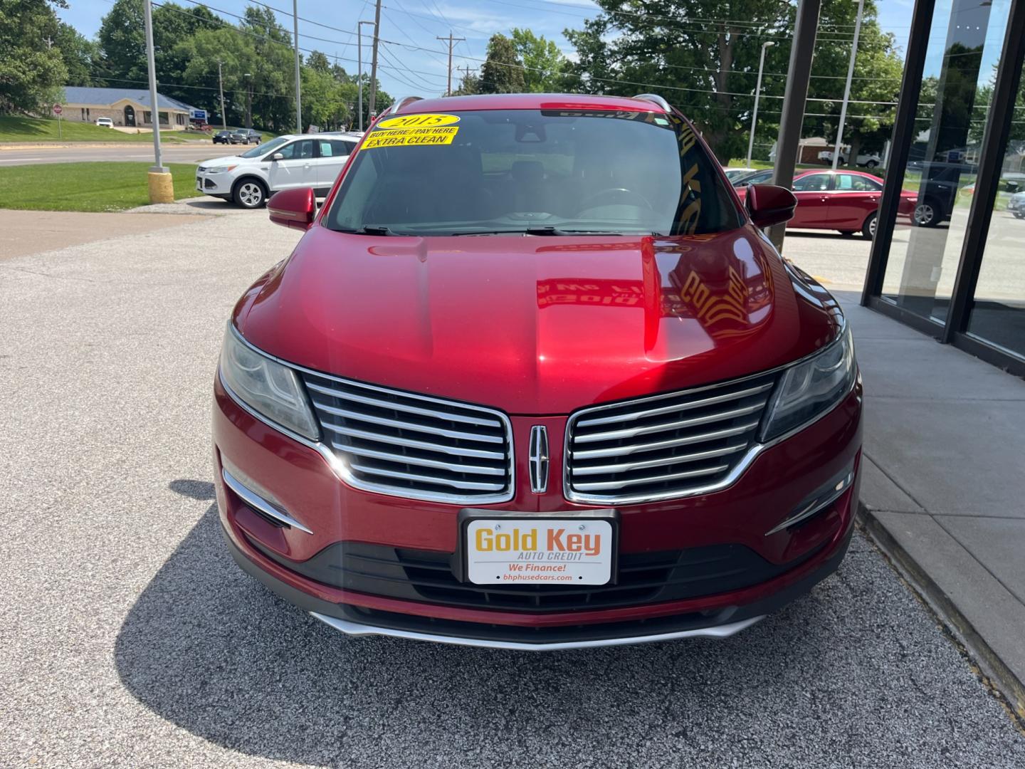 2015 Ruby Red Met Tinted CC Lincoln MKC AWD (5LMCJ2A92FU) with an 2.0L L4 DOHC 16V engine, 6-Speed Automatic transmission, located at 1633 W Kimberly, Davenport, IA, 52806, (563) 323-5341, 41.559456, -90.598732 - Photo#1